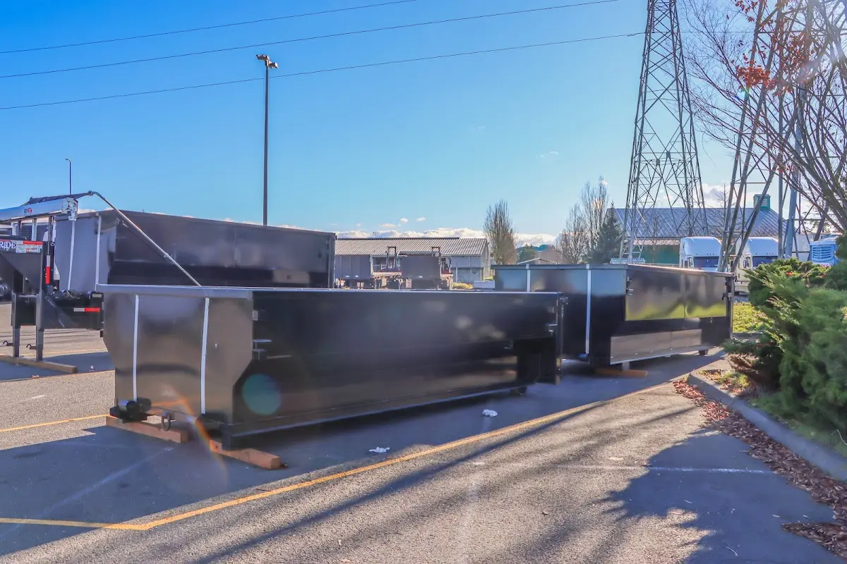 Roll-off dumpster ready for waste disposal at job site for Concrete Dumpster Rental in Dearborn Heights